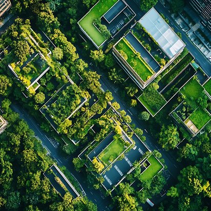 Grüne Stadtquartiere aus der Luftperspektive Luftaufnahme moderner Gebäude mit begrünten Dächern inmitten urbaner Bäume