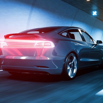 Autorücklichter bei Nacht Das Bild zeigt die Rücklichter eines Autos.