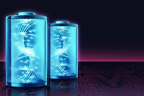 TUEV NORD Wasserstoff Speicherung Zwei futuristisch bläuliche Batterien vor schwarzem Hintergrund